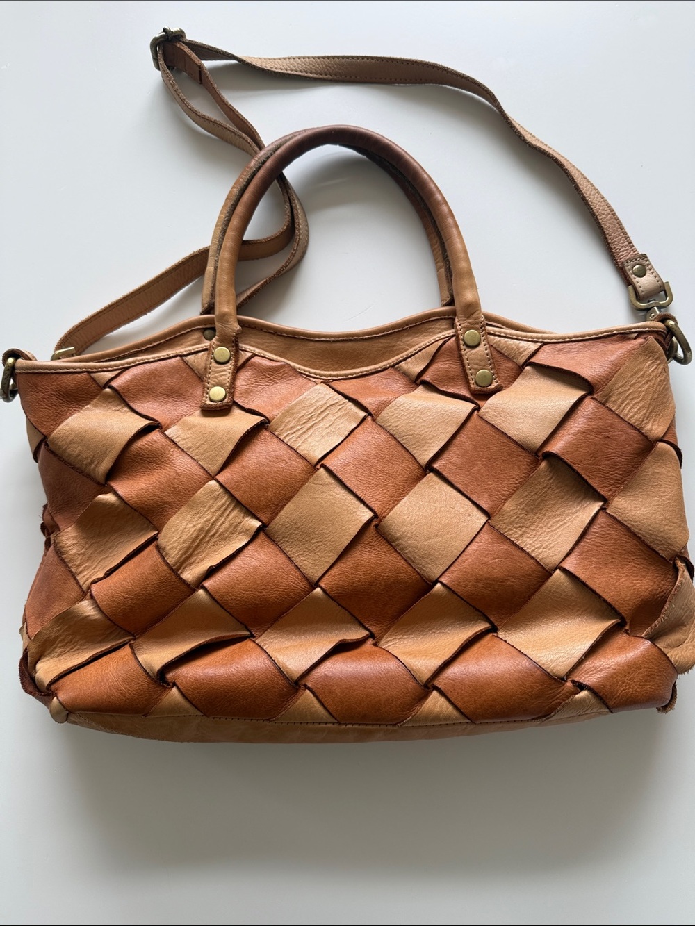 Sundance luggage tan braided leather satchel.  9 x 16 approx.  Lined.